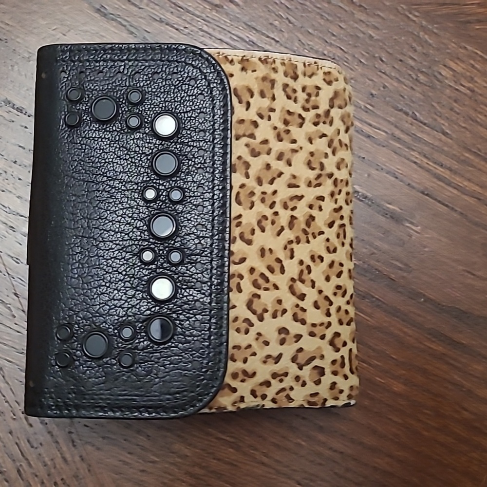 BOTTEGA VENETA bifold wallet in calf hair and leather